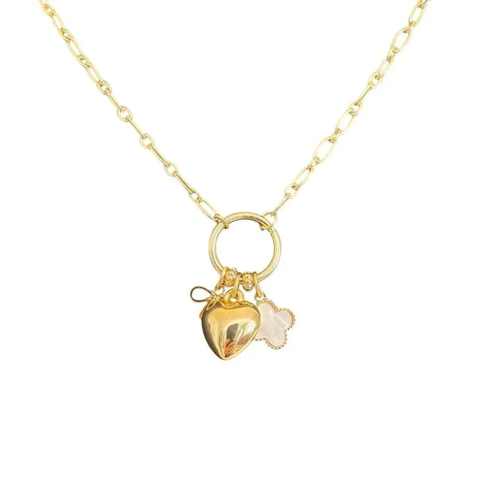 Gold Tone Multi-Charm Necklace w/ Puffy Heart, White Clocer & Gold Bow.